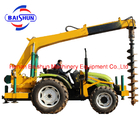 Tractor Mounted Electrical Pole Planter in Thailand